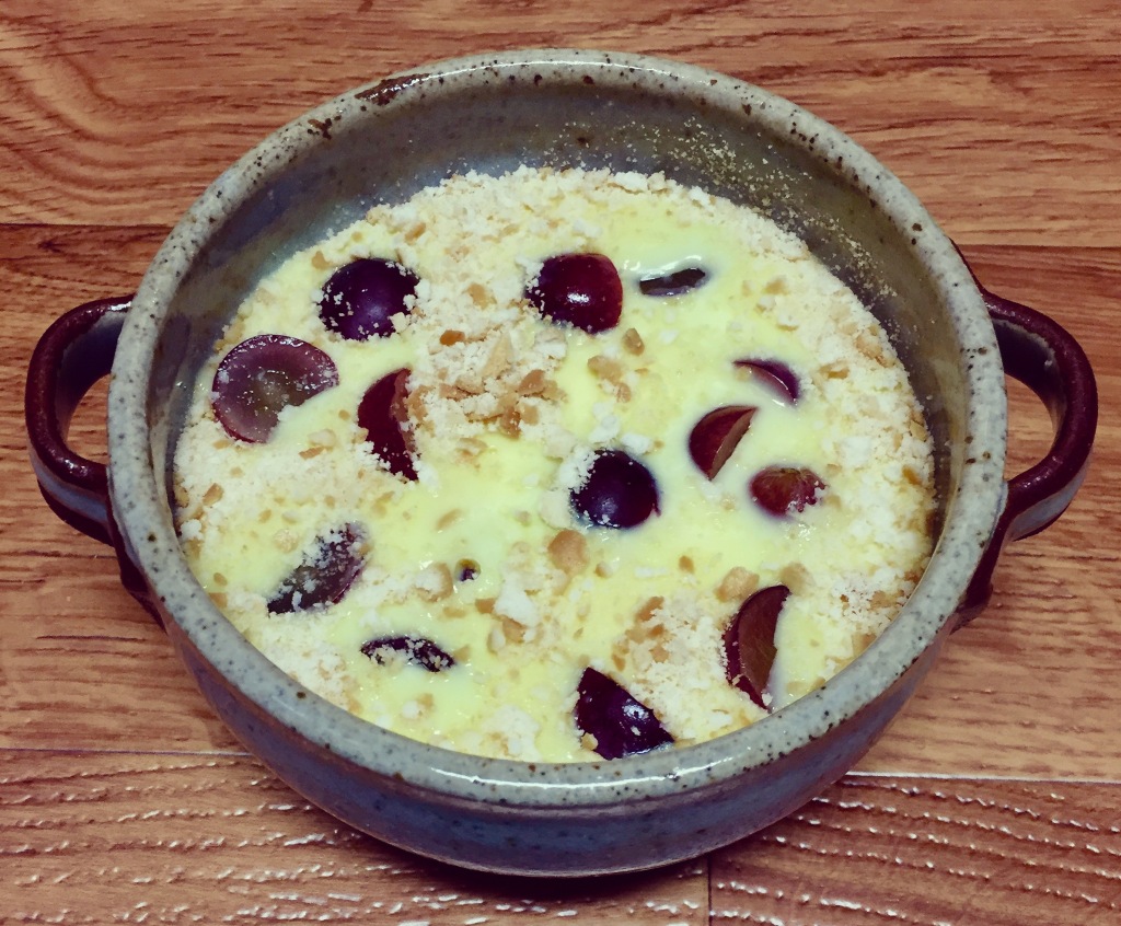 Custard pudding with grapes and Marie biscuit